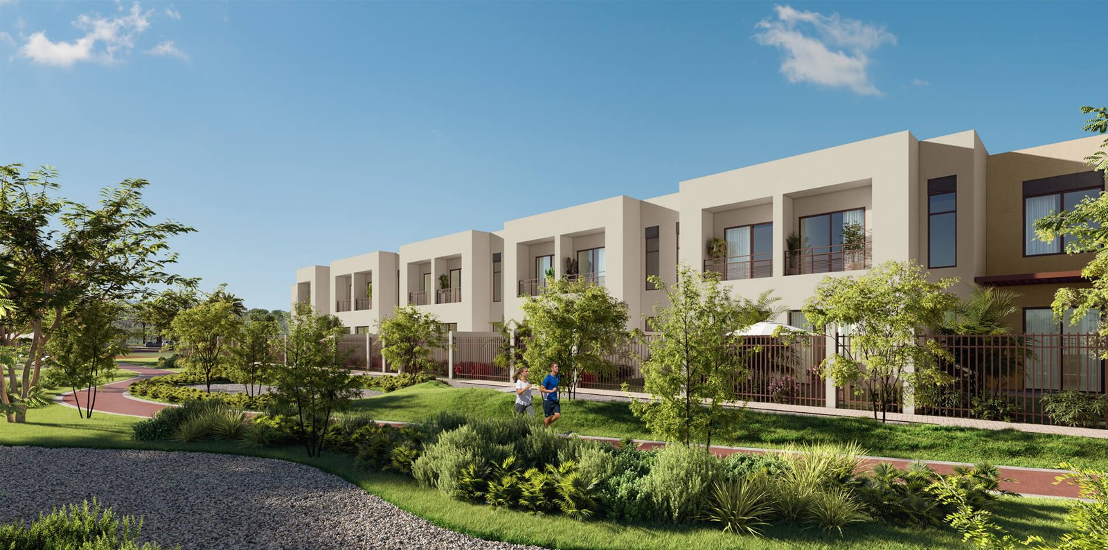 Exterior view of Granada II townhouses with gardens