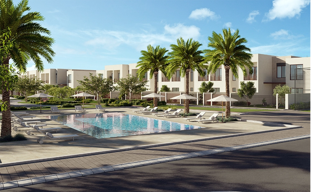 Resort-style pool and palm-lined deck at Granada II