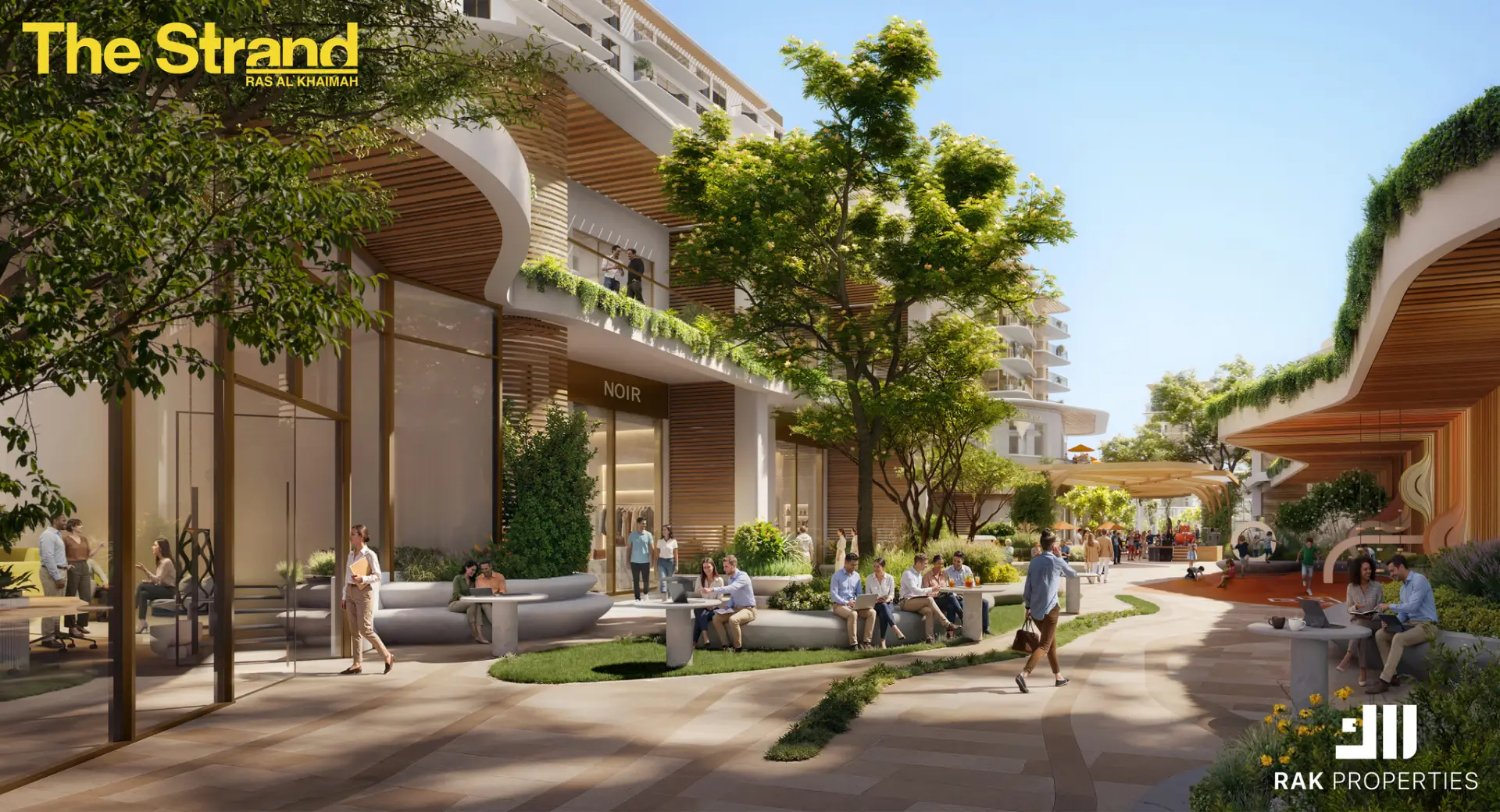 Landscaped courtyard and retail promenade at The Strand Al Marjan Island